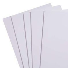 five sheets of white paper stacked on top of each other in front of a white background