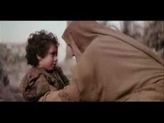 a young child is being held up by an adult in a scene from the movie star wars