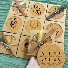 hand holding coasters with different types of wine corks on them, tied together in twine