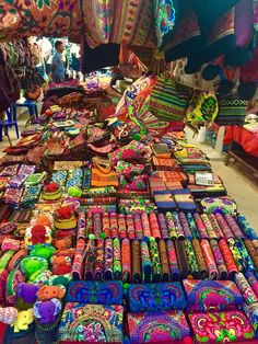 many colorful items are on display at the market