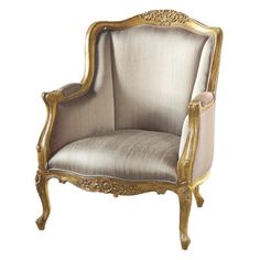 an antique style chair with gold trimmings and fabric upholstered to the back