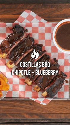 some food is sitting on top of a red and white checkered paper with the words costas bbq chipotle + blueberry