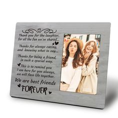 a wooden frame with the words, we are best friends and two girls in white