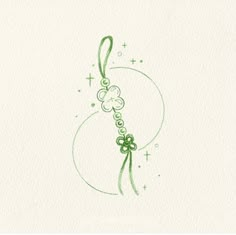 a drawing of a green ribbon and shamrocks on a white paper with the letter c