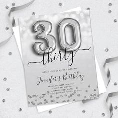 the 30th birthday party card is shown with silver foil