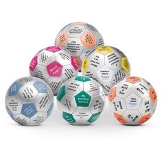 five soccer balls with different words on them, all labeled in different colors and sizes