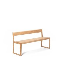 a wooden bench sitting on top of a white floor