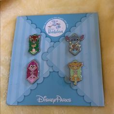 the disney parks pin set is on display