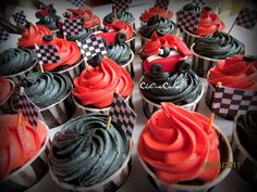 cupcakes decorated with red and black frosting