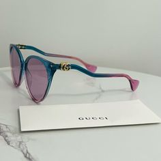 Brand New, Authentic, Gucci Transparent Sunglasses. Very Chic And Sophisticated, Comes With All Original Packaging Shown In Photos. Frame Color: Blue Pink Frame Shape: Cat Eye Detailed Lens Color: Pink Lens Protection: 100% Uv Protection Polarization: Non-Polarized Lens Width: 57 Mm Arm Length: 140 Mm Bridge Width: 17 Mm Designer Multicolor Tinted Sunglasses, Fenty Sunglasses, Transparent Sunglasses, Photos Frame, Unique Sunglasses, Fashion Vogue, Pink Frame, Eye Details, Ford Accessories