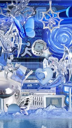 a computer screen with blue and silver items on the bottom, in front of it