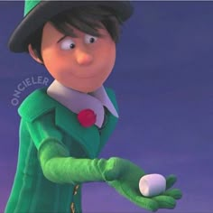 the animated character is holding an egg in his hand and wearing a green outfit with white collar