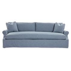 a blue couch with two pillows on it and one arm folded back to the side