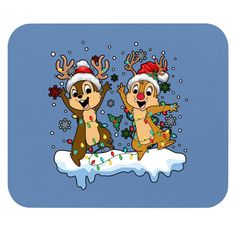 two reindeers are dancing in the snow with christmas decorations on their heads and noses