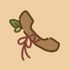 a brown shoe with a green leaf on it's laces and a pink ribbon