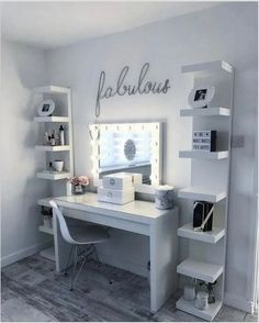 a white desk sitting in front of a mirror