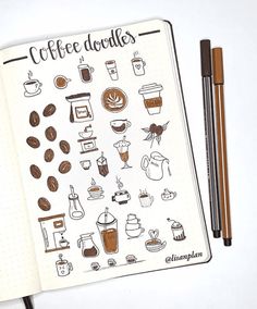 an open notebook with coffee doodles on it