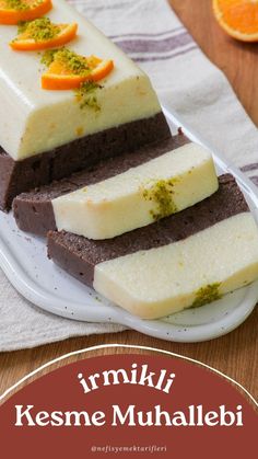 three pieces of cake sitting on top of a white plate next to an orange slice