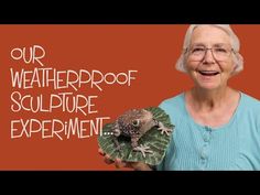 an older woman holding a frog on top of a green leaf with the words our weatherproof sculpture experiment