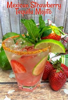 the mexican strawberry tequila mojito is garnished with lime and strawberries