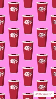 red cups with white lettering on a pink background