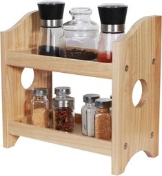 a wooden spice rack with jars and spices