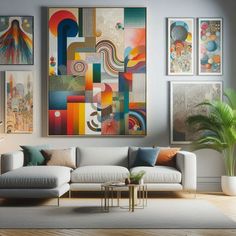 a living room filled with furniture and paintings on the wall above it's couch