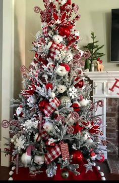 a christmas tree decorated with red and white ornaments