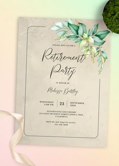 an elegant retirement party with flowers and greenery on the front, along with a white ribbon