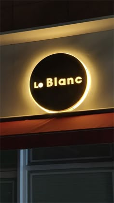 an illuminated sign that reads l'blancc on it