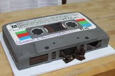 a cake made to look like an old school cassette tape recorder