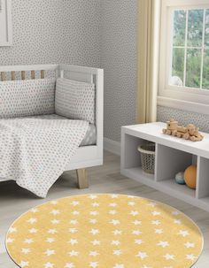 a child's bedroom with yellow and white stars on the rug, bookshelves and toys