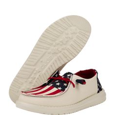 HEYDUDE | Women's Casual | Wendy Americana - Americana | Size 5 - Show your pride with every stride in the Wendy Americana. With its flexible support and cushiony insole, this all-American shoe boasts all-day comfort from the BBQ to the beach. Shoe Specs: Canvas top Elastic laces Lightweight outsole Flexible outsole Easy-on system Travel ready Removable foam insoleRelaxed Fit: Ample roominess allows for laid-back, easygoing feel Women's Casual Shoes, Wendy Americana - Americana, Hey Dude, HEYDUD Hey Dude Shoes Women, School Uniform Shoes, School Uniform Kids, Hey Dudes, Hey Dude, Elastic Laces, Mens Casual Dress, Boots And Sneakers, Sneaker Shopping