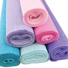 several colors of fabric laid out on top of each other