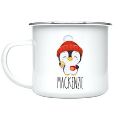 a white enamel mug with a penguin wearing a red hat