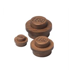 three wooden knobs with the word lego on them