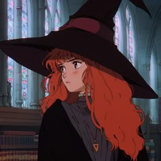 a woman with long red hair wearing a witches hat in front of a bookcase