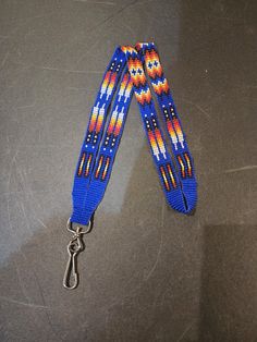 Loom Beaded Lanyard or Badge Holder. #10 Czech beads.  5/8" wide x 19" long measured from the back of the neck to the bottom of the metal clip. Beaded Lanyard, Beaded Lanyards, Czech Beads, Badge Holder, Badge Holders Lanyard, Badge Holders, Lanyard, Loom, Beads