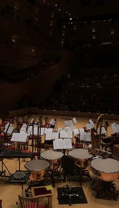 an empty concert hall with lots of musical instruments