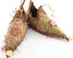 two pairs of shoes are decorated with flowers and beads on the bottom one pair is brown