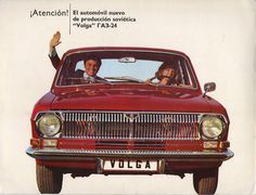 an advertisement for volvo showing two people waving from the passenger seat in a red car