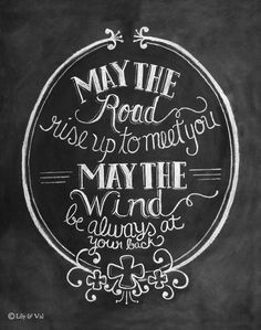 a chalkboard drawing with the words may the road rise up to meet you, may the wind and always at rest