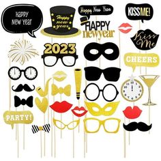 happy new year party photo booth props with gold glitter and black top hats, glasses, mustaches