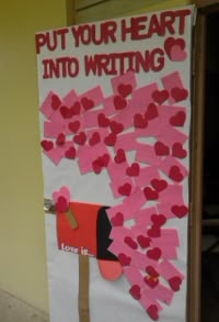 a bulletin board with hearts on it that says put your heart into writing