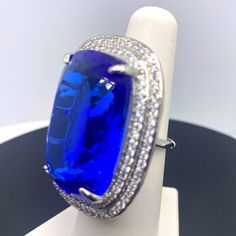 New Never Used Blue Sterling Silver Ring, Blue Gemstone Jewelry For Anniversary, Tanzanite Jewelry For Wedding, Blue Tanzanite Jewelry For Wedding, Blue Fine Jewelry Ring For Party, Adjustable Light Blue Formal Jewelry, Blue Party Ring Jewelry, Round Blue Sapphire Jewelry, Blue Ring Jewelry For Party