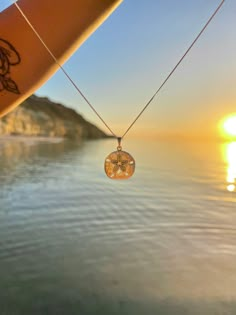 "The sea, once it casts it's spell, holds one in it's net of wonder forever" 🐚 This sandollar necklace is for those who feel at home in the ocean, with salty hair and bare feet. Wear the ocean with you in our unique ocean lover jewellery. Made in 925 sterling silver all our ocean jewellery is perfect to wear in the water and to never take off 🐚 Part Size: 21mm x 28mm and comes with a 45cm sterling silver chain! 🐚 Did you know that sand dollars, in addition to being fascinating marine creature Silver Beachy Jewellery, Silver Summer Jewelry, Summer Jewlery, Ocean Things, Minimalist Necklace Silver, Sand Dollar Necklace, Surf Jewelry, Sea Necklace, Beachy Jewelry