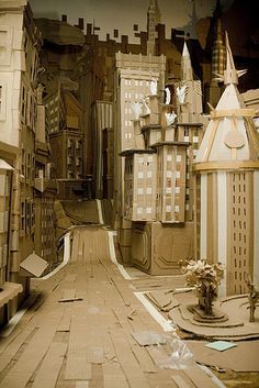 there are many cardboard buildings on the street