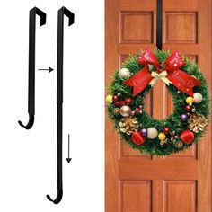 a christmas wreath hanging on the front door with an arrow pointing to it's side