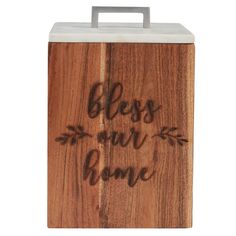 a wooden box with writing on it that says,'bless our home'in black ink