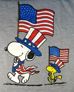 snoopy and the american flag on a gray shirt